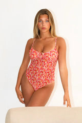 Pink Garden tuetulla yläosalla varustettu läpiruskettava uimapuku
